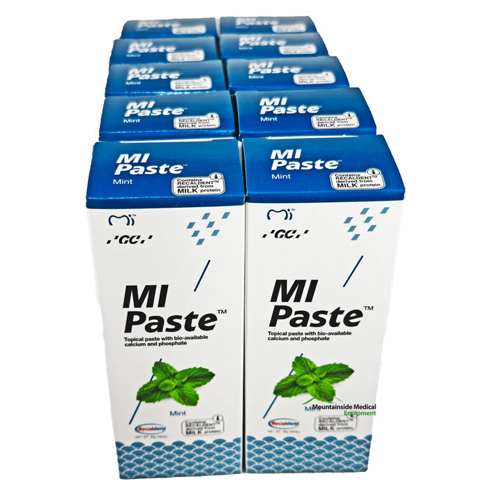 Mi Paste Mint tube alongside toothbrush, promoting enamel strength, cavity protection, and reduced tooth sensitivity for oral health.