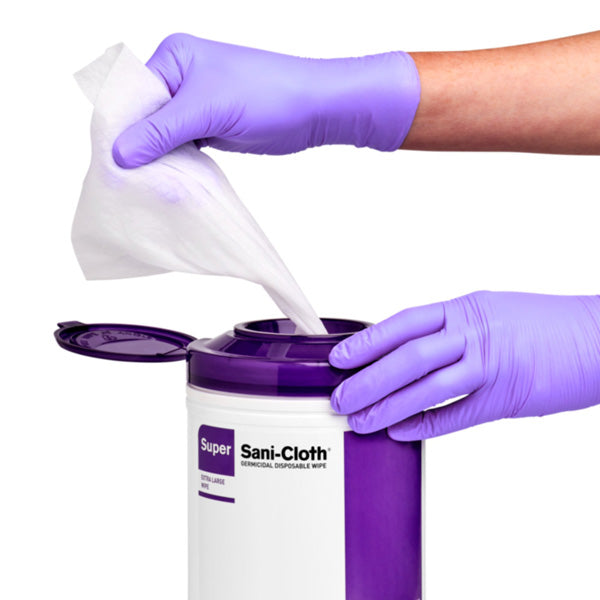 Nurse Pulling Super Sani Cloth Germicidal Disposable Wipe from Canister